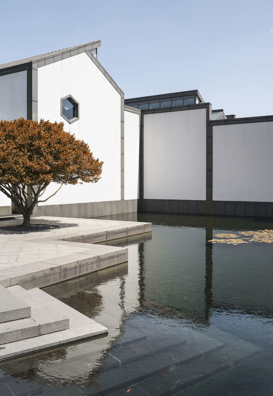 REFLECTION OF BUILT STRUCTURES IN WATER