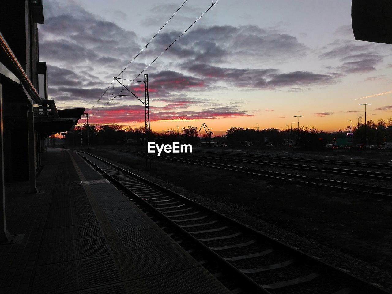 RAILROAD TRACK AT SUNSET