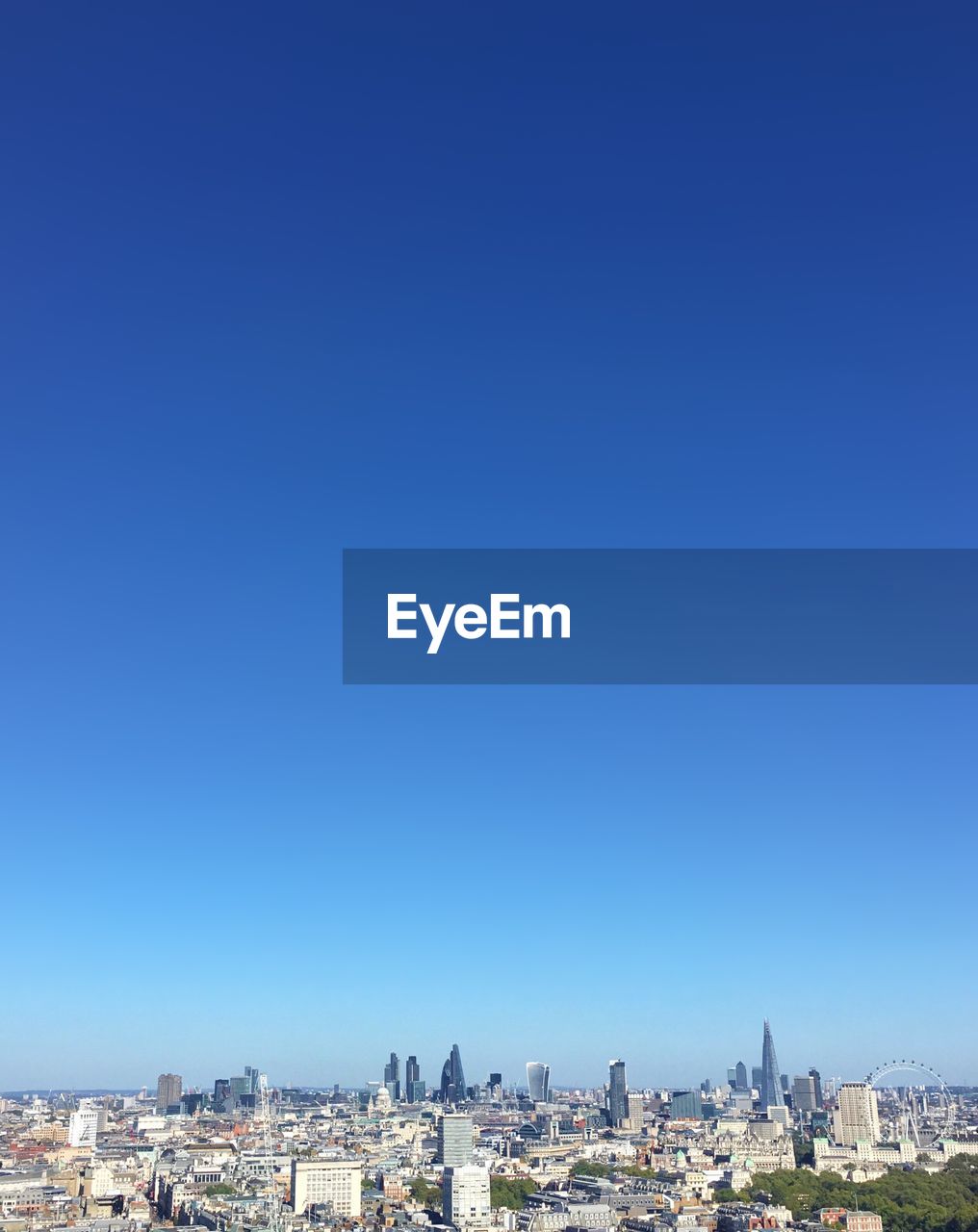 Cityscape against blue sky