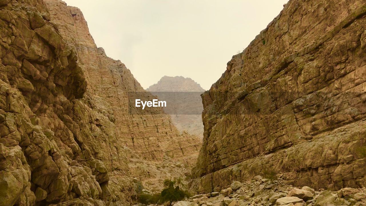 LOW ANGLE VIEW OF ROCKY MOUNTAINS