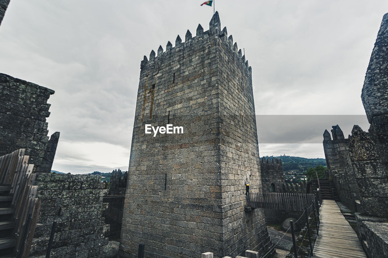 Low angle view of historic building against sky