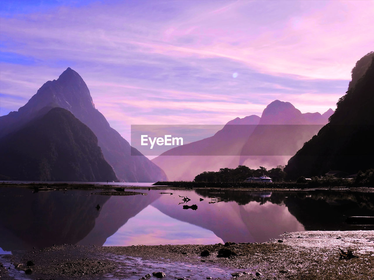 Milford Sound Beauty In Nature Day Lake Mountain Mountain Range Nature New Zealand New Zealand Scenery No People Outdoors Reflection Scenics Sky Sunset The Great Outdoors - 2017 EyeEm Awards Tranquil Scene Tranquility Travel Travel Destinations Water EyeEmNewHere The Great Outdoors - 2018 EyeEm Awards The Traveler - 2018 EyeEm Awards Summer Road Tripping 50 Ways Of Seeing: Gratitude It's About The Journey