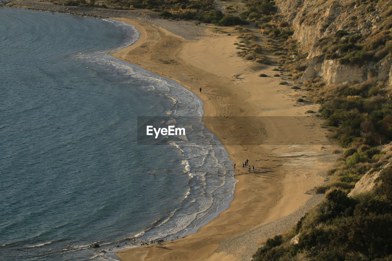 water, land, coast, beach, sea, nature, environment, shore, beauty in nature, scenics - nature, landscape, high angle view, no people, aerial photography, sand, body of water, tranquility, outdoors, day, aerial view, terrain, cliff, non-urban scene, wave, geology, reservoir, travel, travel destinations, tranquil scene, plant, ocean, coastline