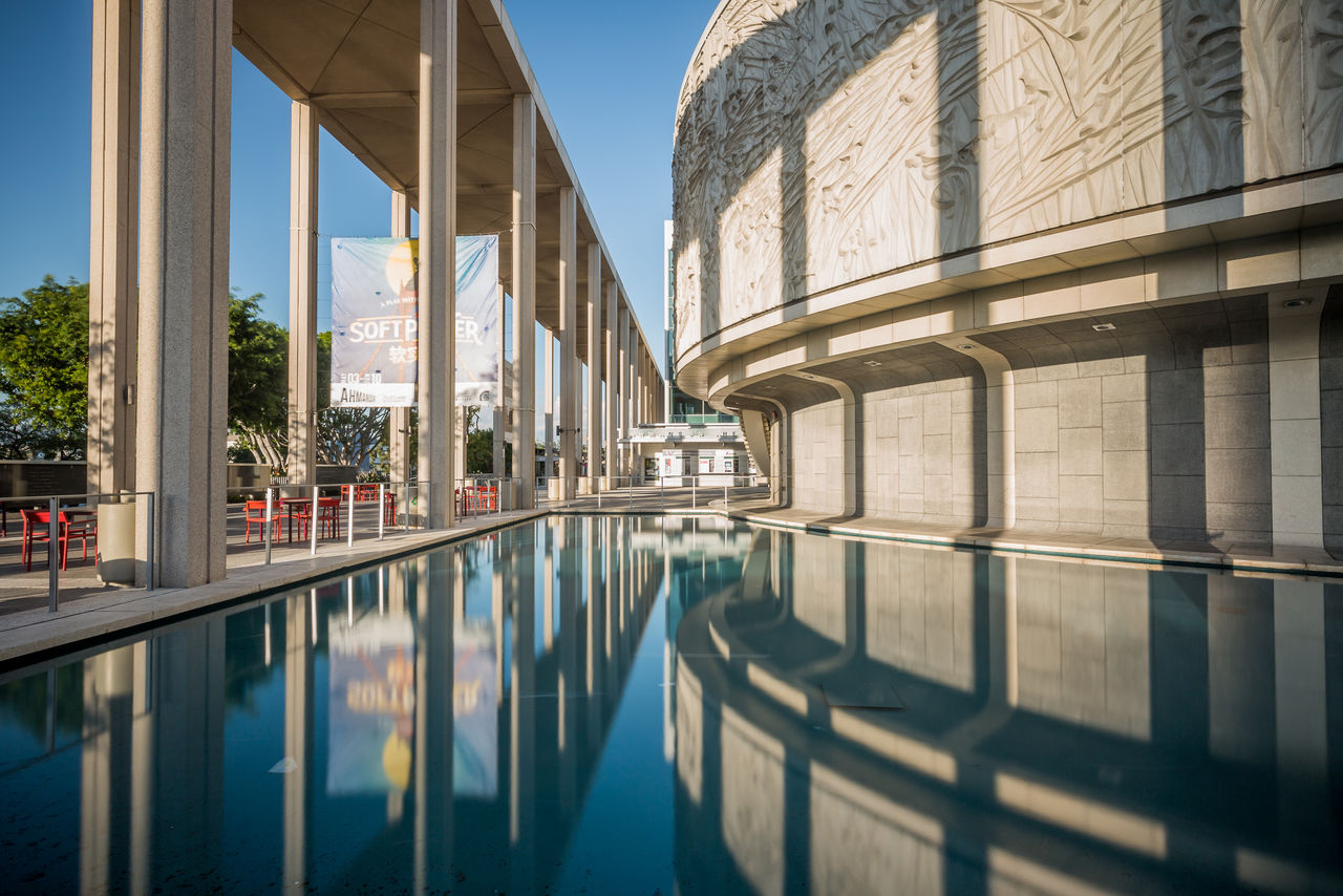 REFLECTION OF BUILDING IN WATER