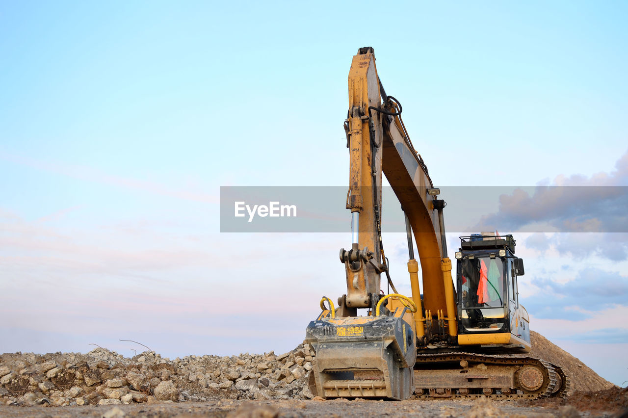 CRANE AT CONSTRUCTION SITE