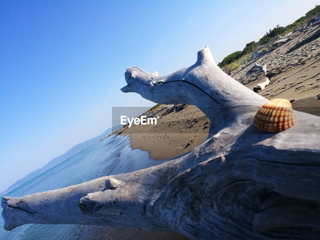 SCENIC VIEW OF ROCK AGAINST CLEAR SKY