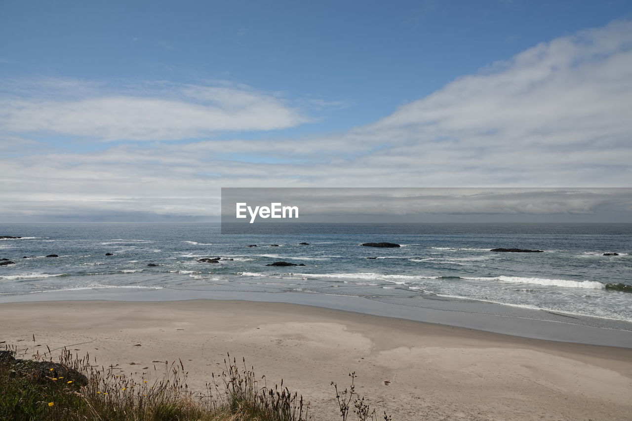 VIEW OF BEACH AGAINST SKY