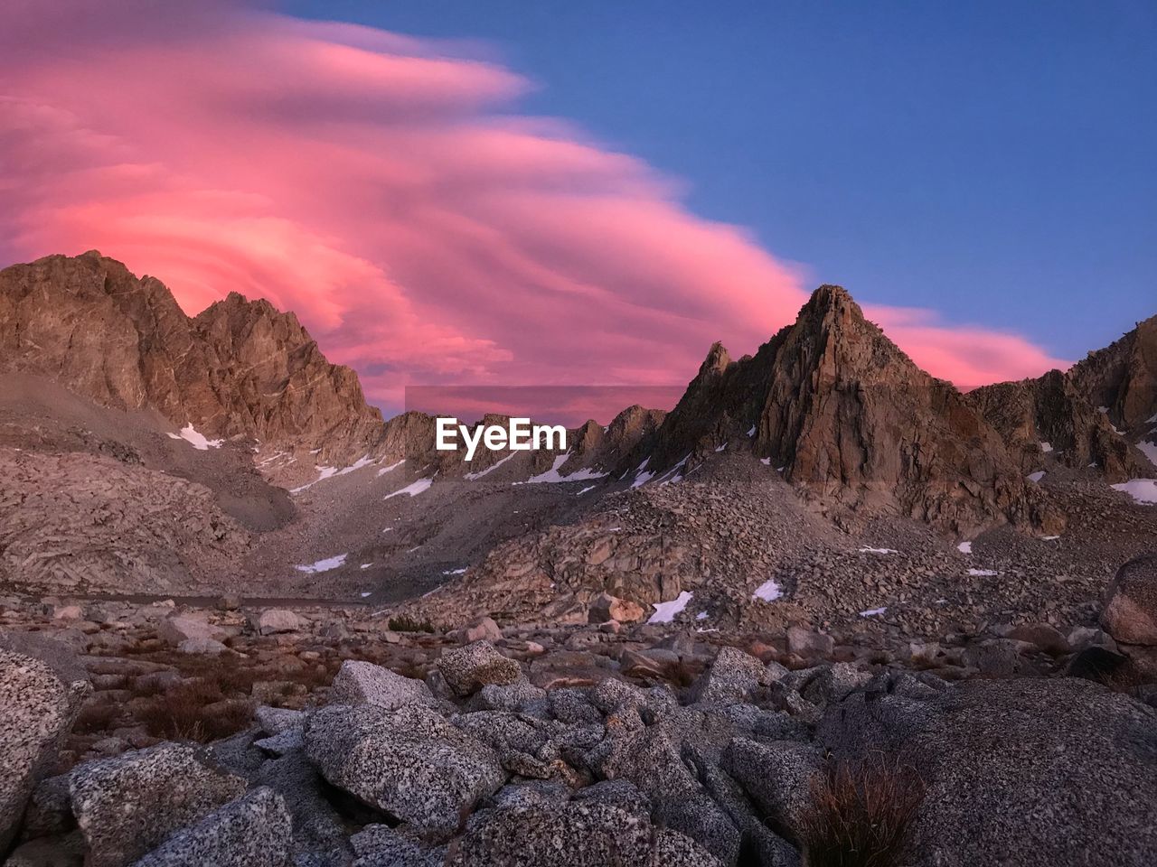 Scenic view of mountains against sky during sunset