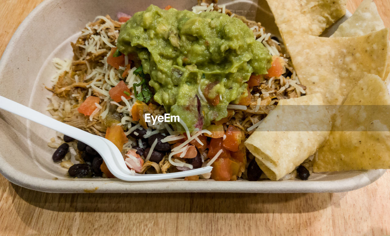 HIGH ANGLE VIEW OF VEGETABLES IN CONTAINER