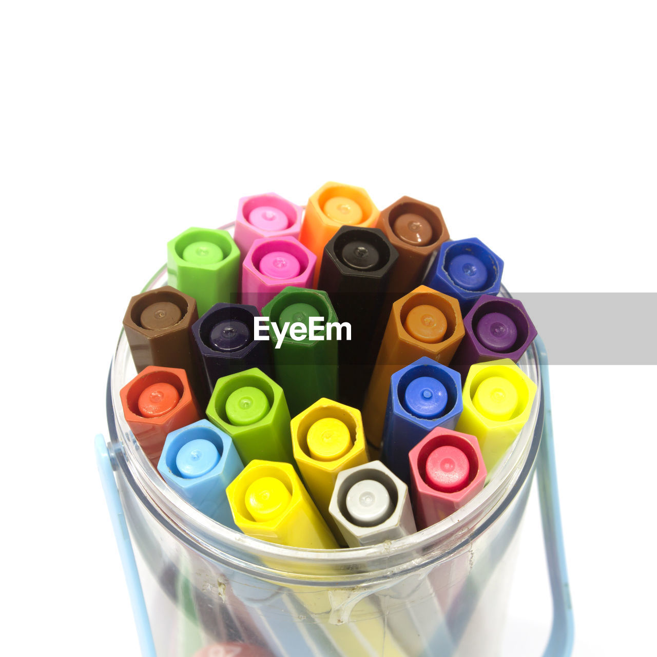 High angle view of multi colored pens against white background