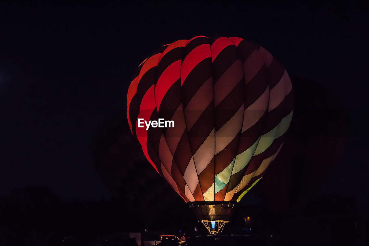 LOW ANGLE VIEW OF HOT AIR BALLOON AGAINST SKY