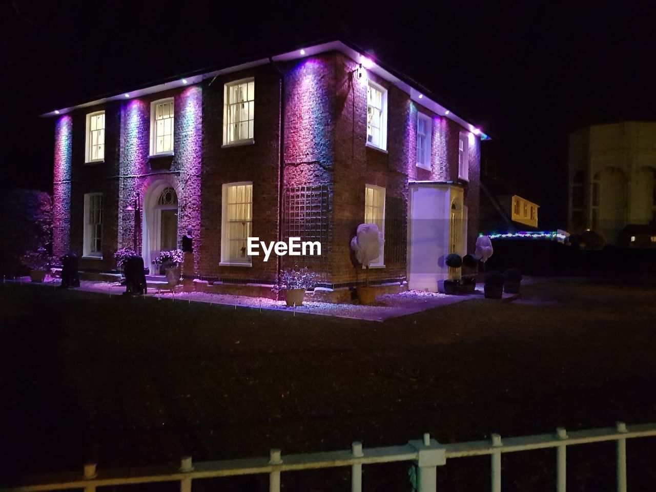 ILLUMINATED BUILDINGS AT NIGHT