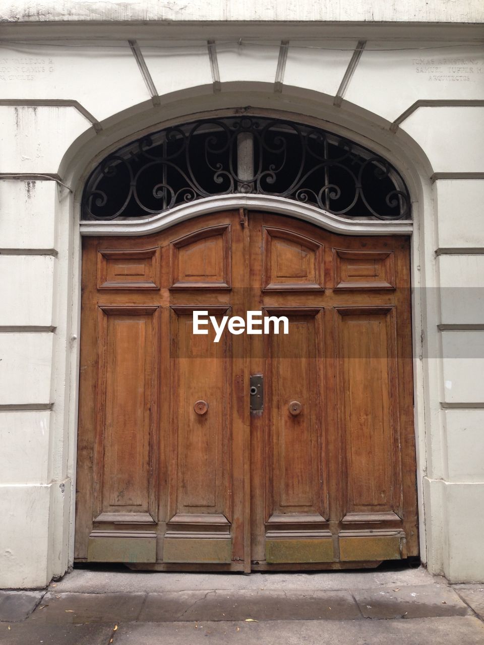 CLOSED WOODEN DOOR OF OLD BUILDING