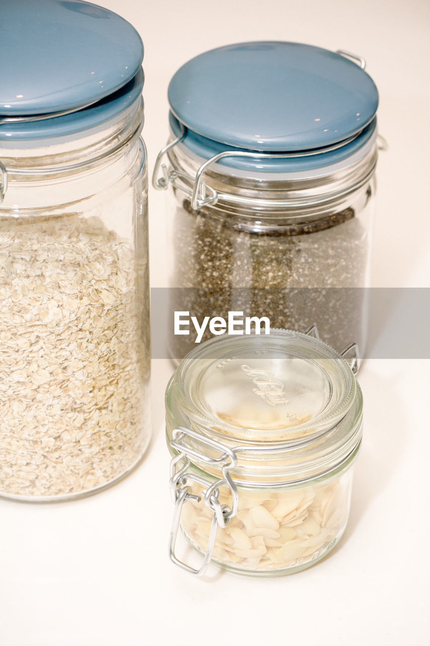 Ingredients in glass containers on table