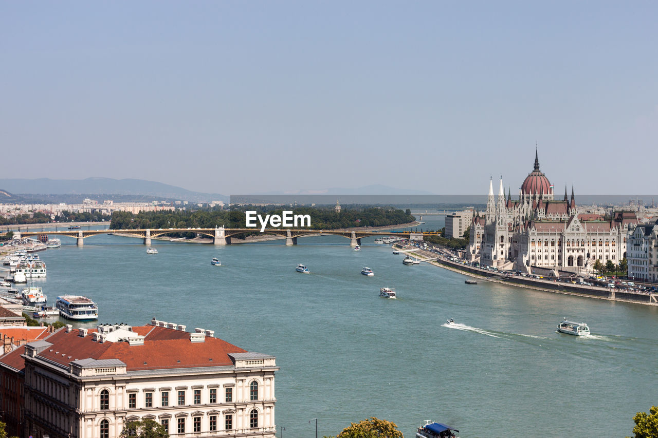 Panoramic view of buildings and city against sky