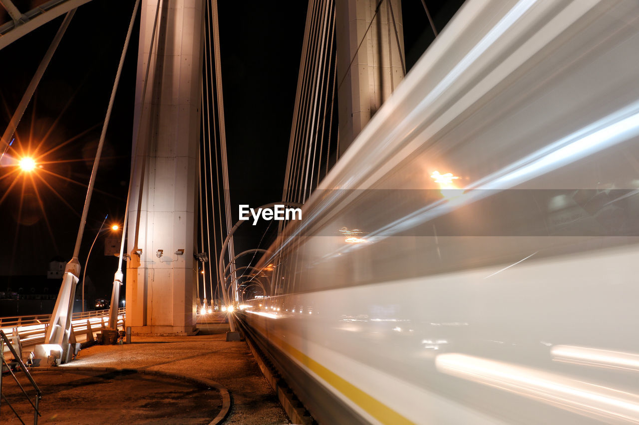 Light trails against sky at night