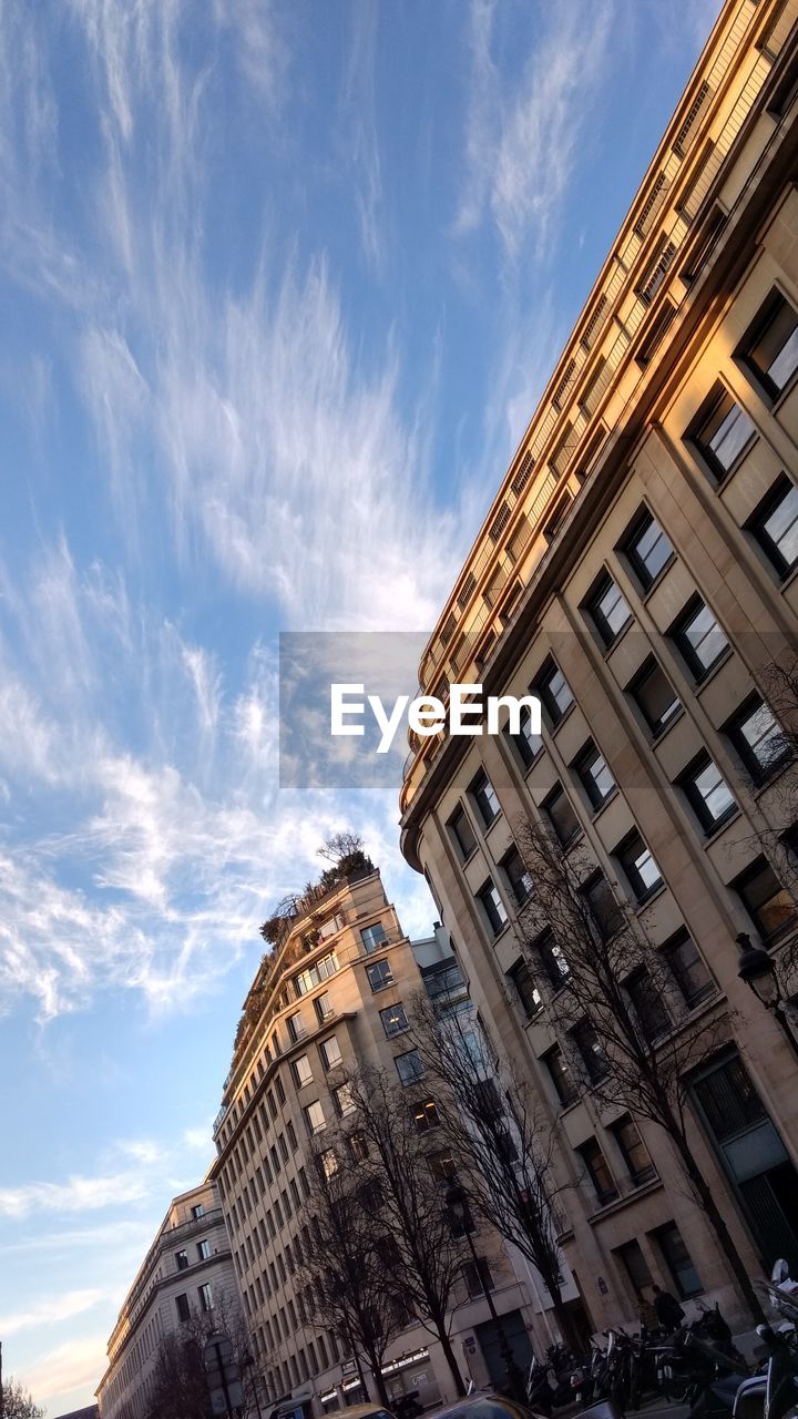 LOW ANGLE VIEW OF RESIDENTIAL BUILDINGS AGAINST SKY
