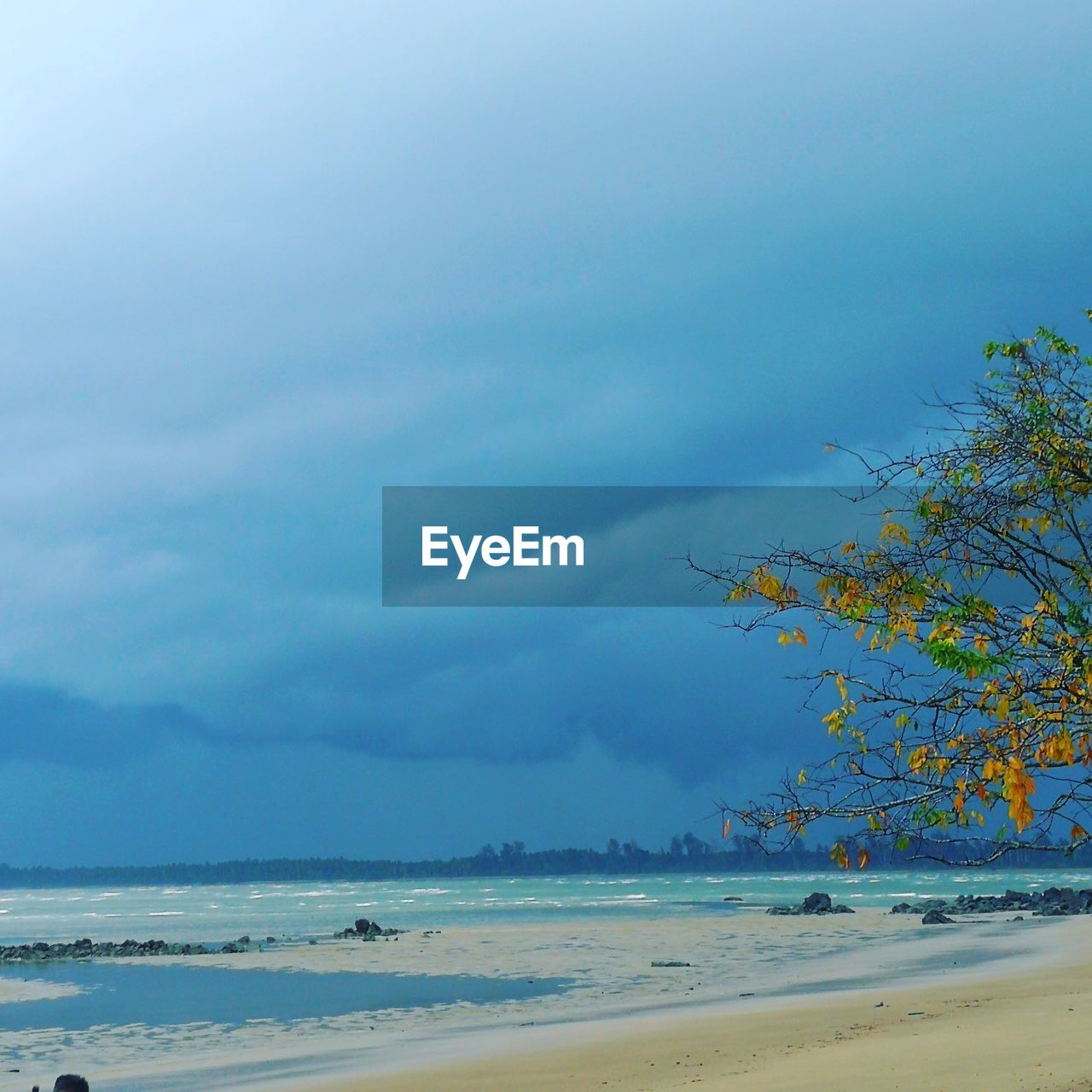 VIEW OF BEACH AGAINST SKY