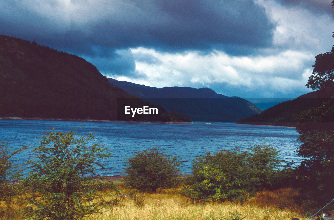 SCENIC VIEW OF MOUNTAINS AND SEA