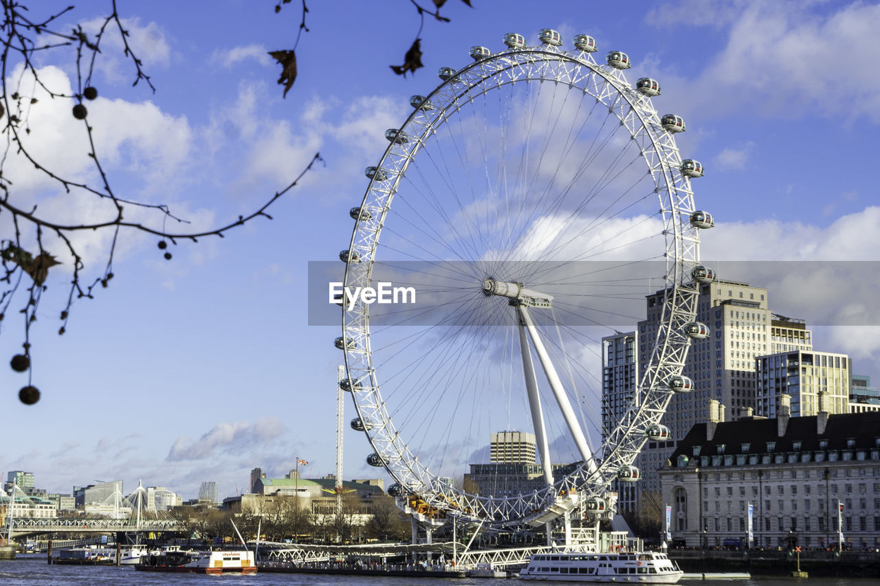 VIEW OF FERRIS WHEEL IN CITY