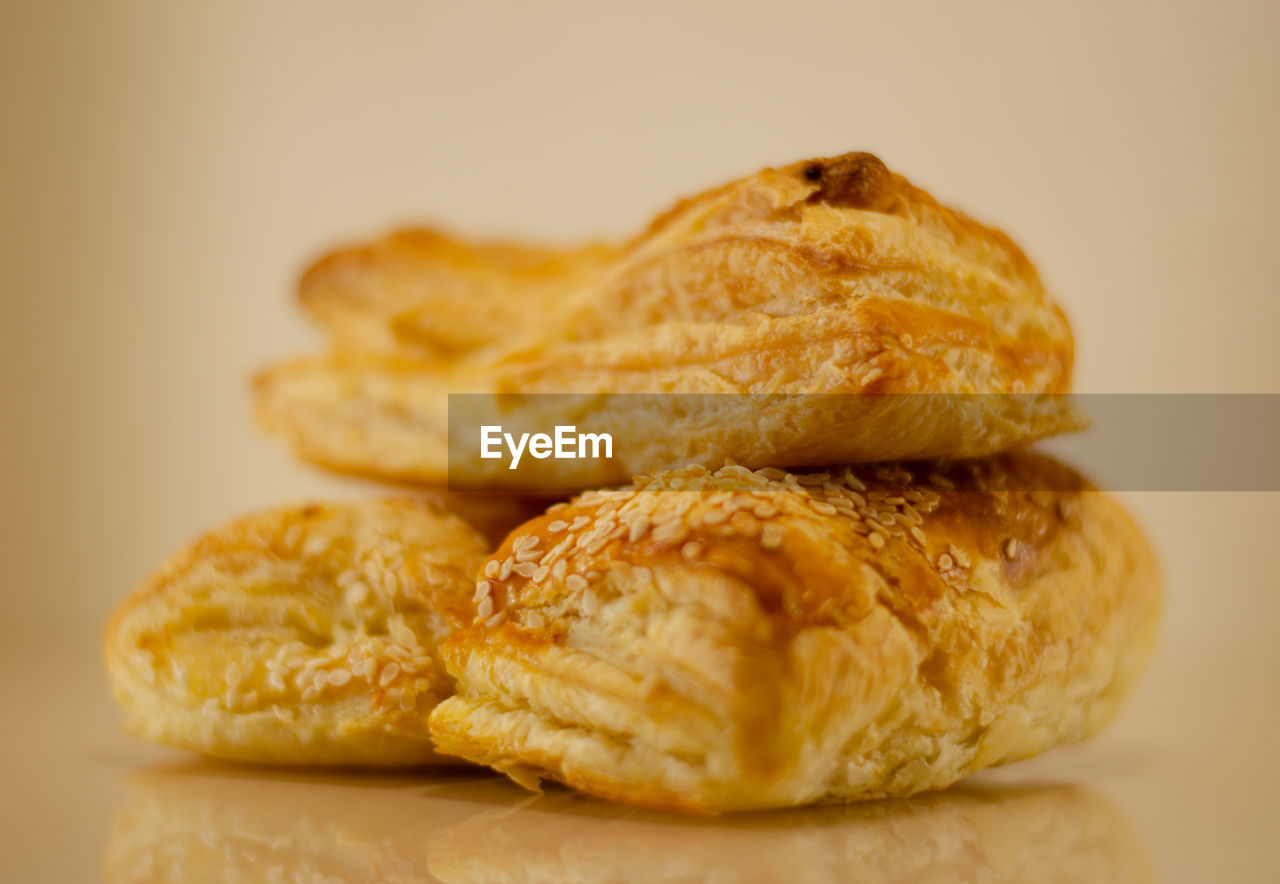 CLOSE-UP OF BREAD ON TABLE