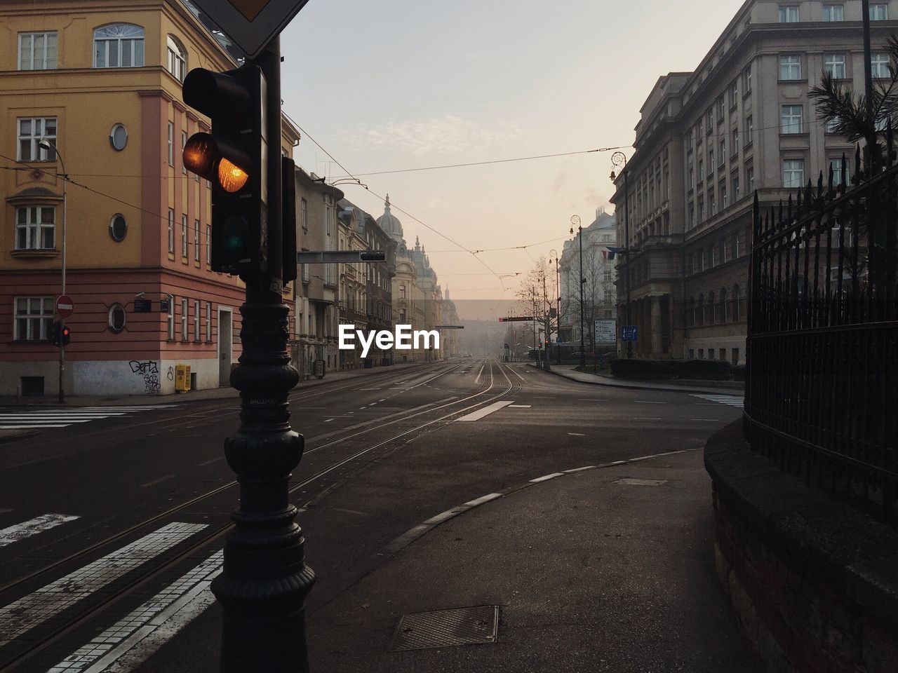 Street in city against sky