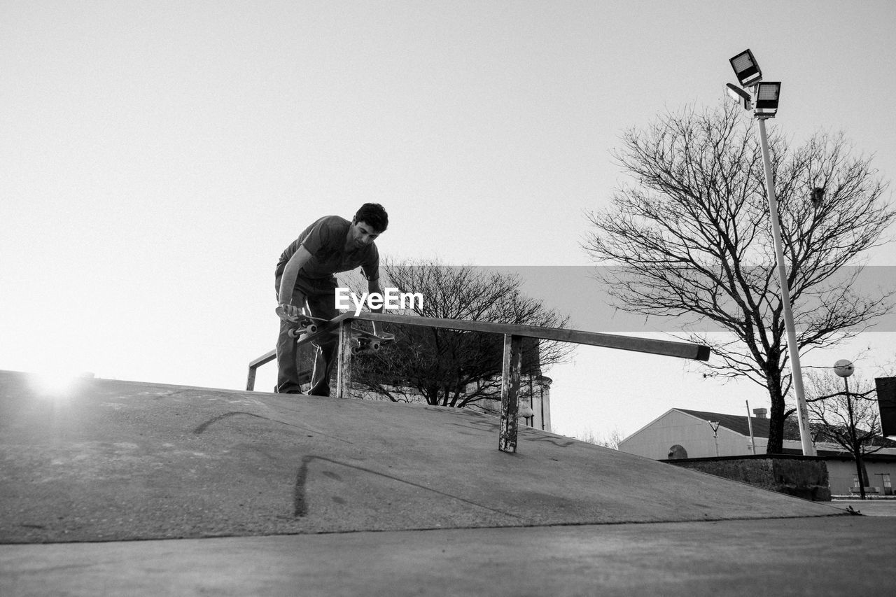 Skateboarder in skate park