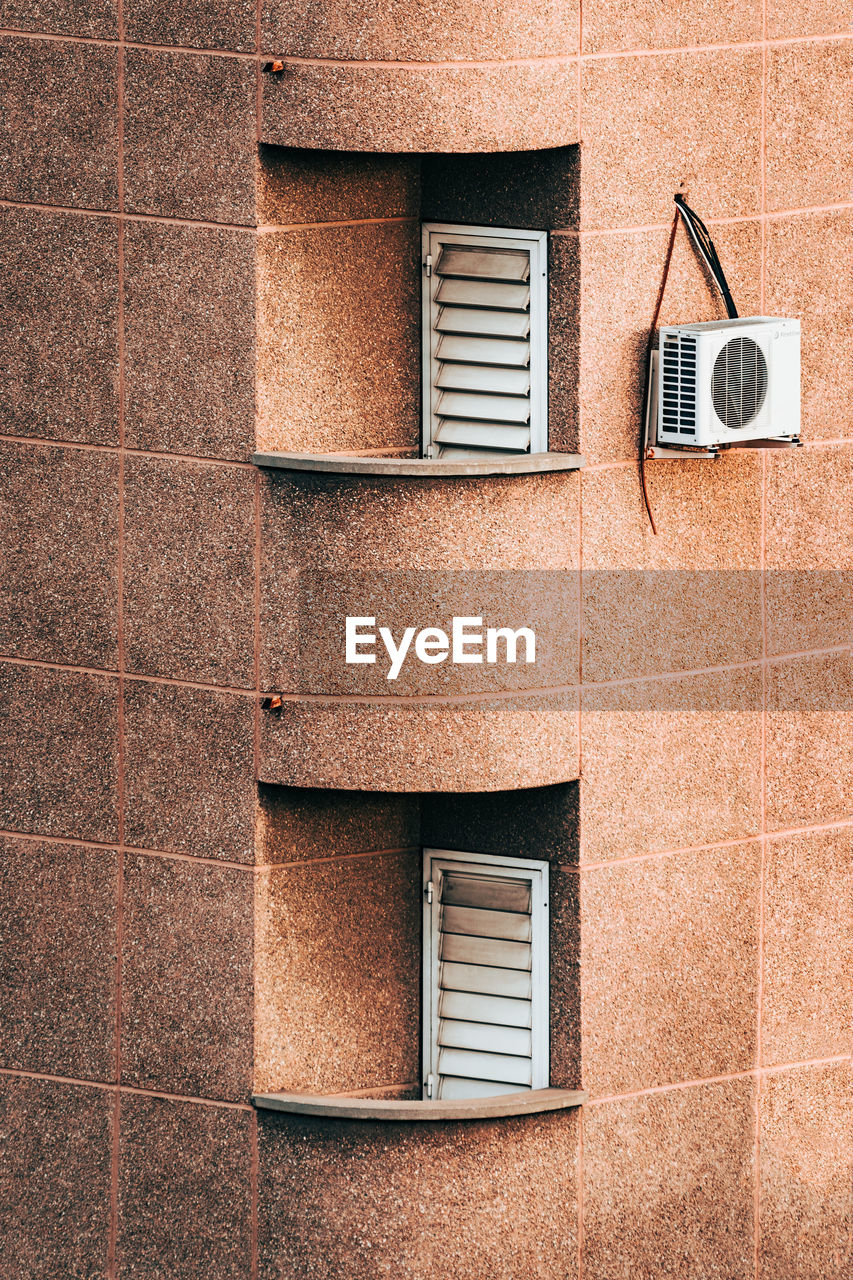 Low angle view of building on wall