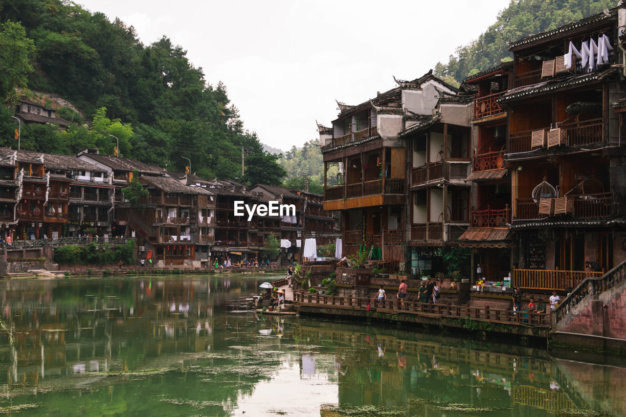 reflection of buildings in lake