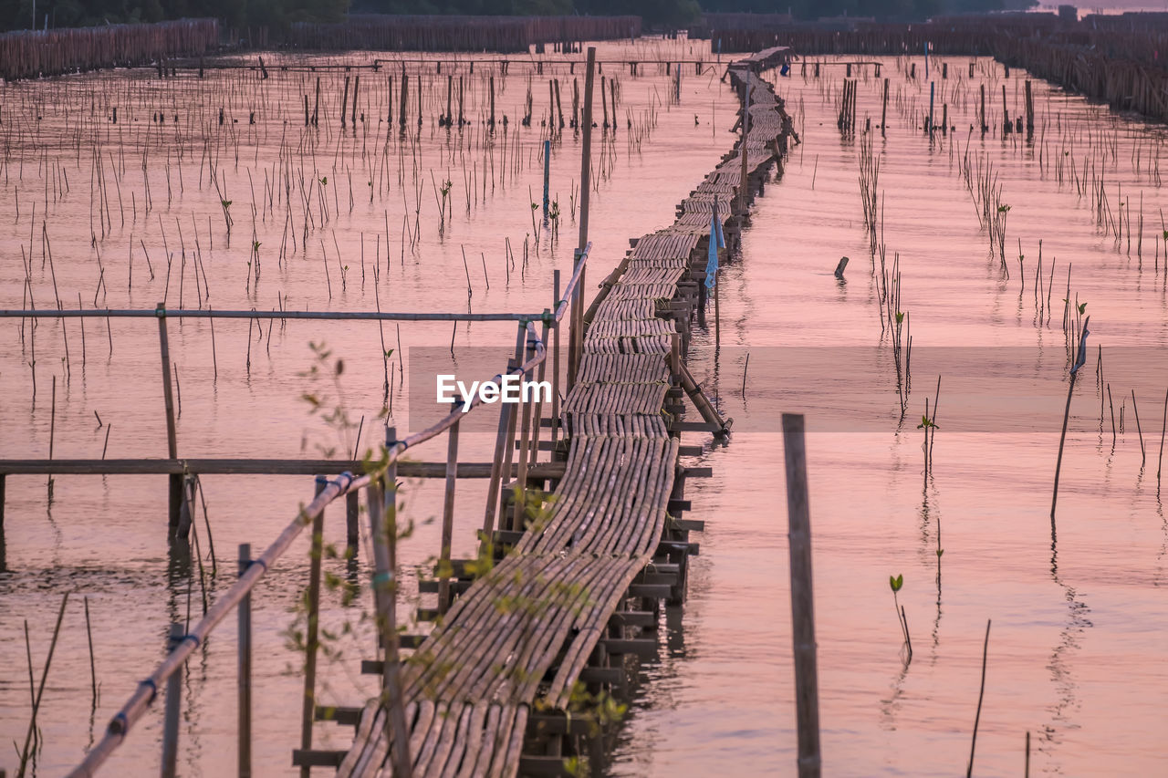 High angle view of wooden post in river