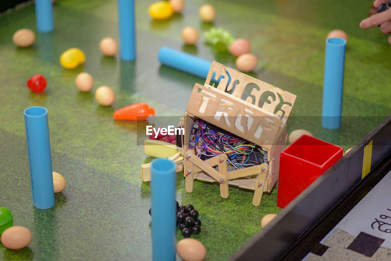 High angle view of plastic toys on table