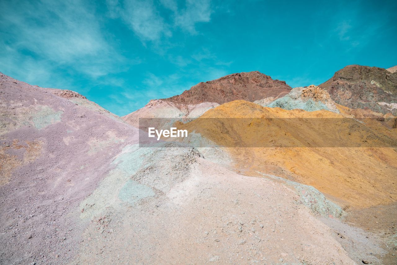 Scenic view of rocky mountains against sky