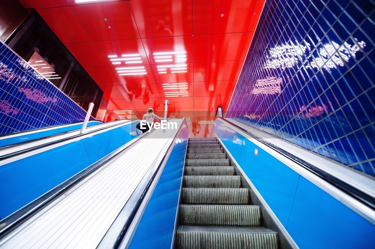 Low angle view of escalators at subway