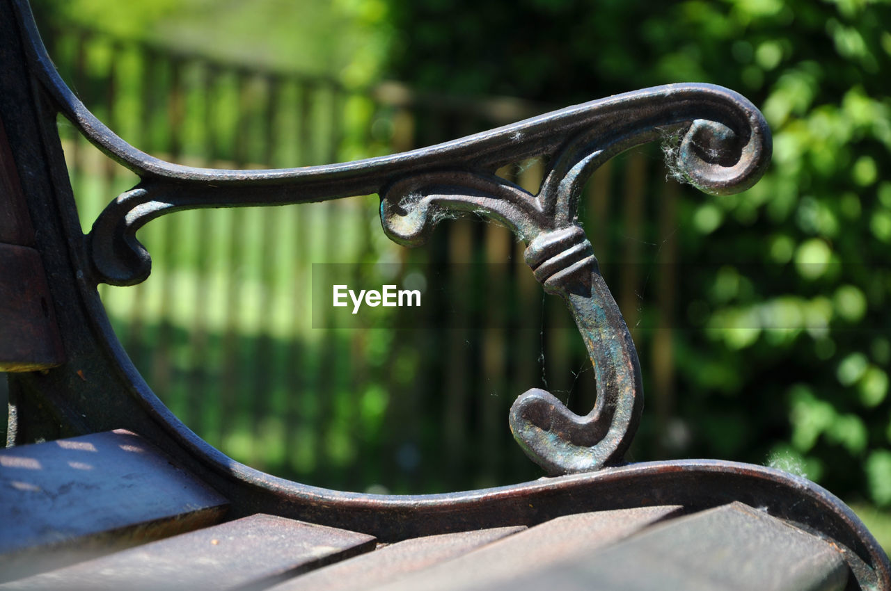 Close-up of rusty bench