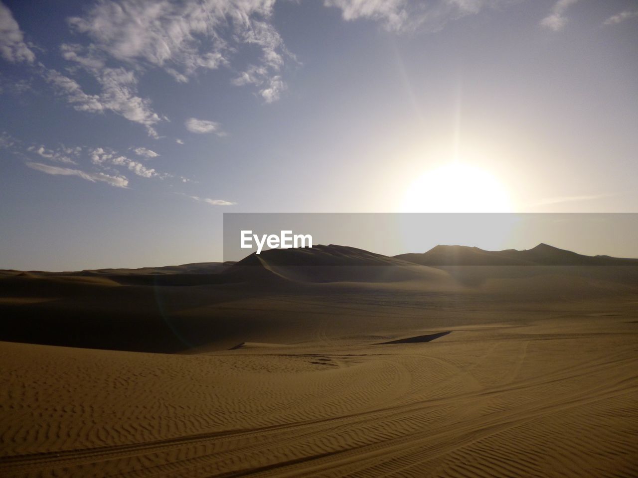 Scenic view of desert against sky