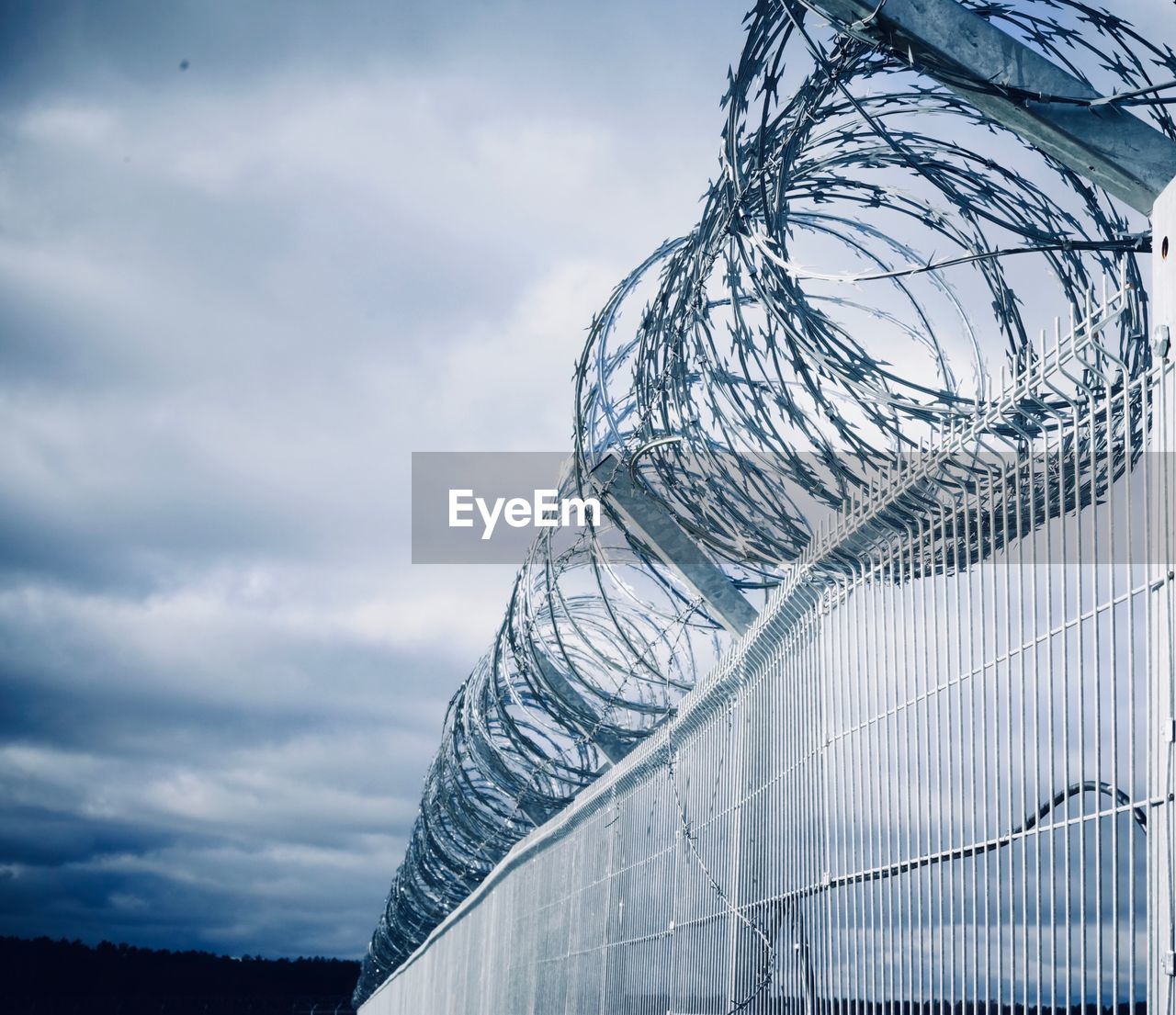 Low angle view of metal structure against sky