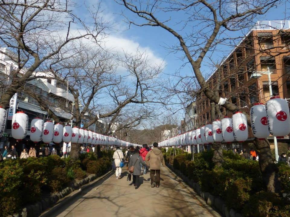 PEOPLE WALKING ON WALKWAY