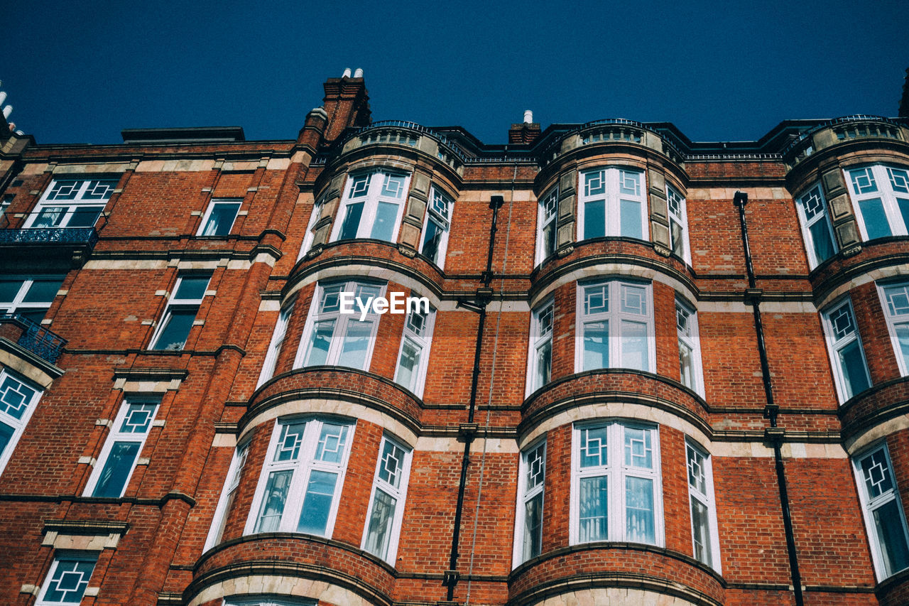 Low angle view of historic building against sky