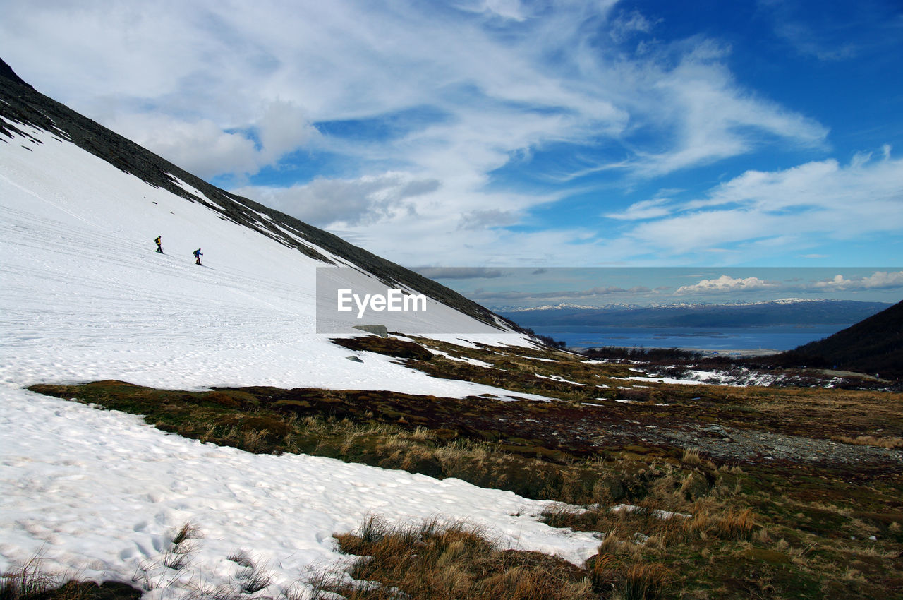 Scenic view of snowcapped mountain against sky