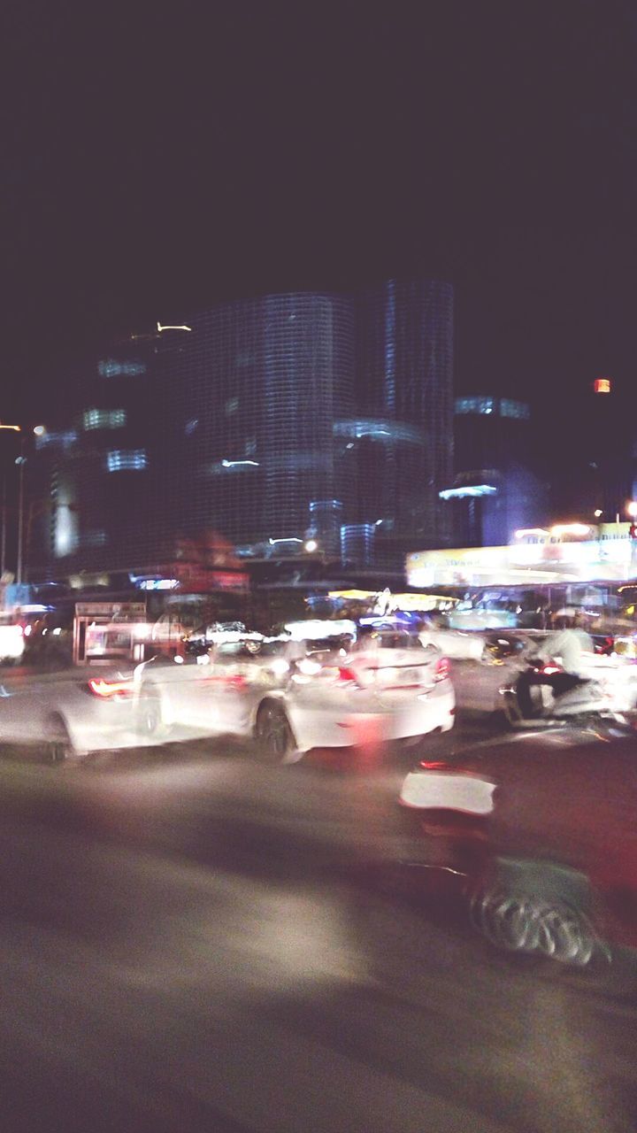 TRAFFIC ON ROAD AT NIGHT