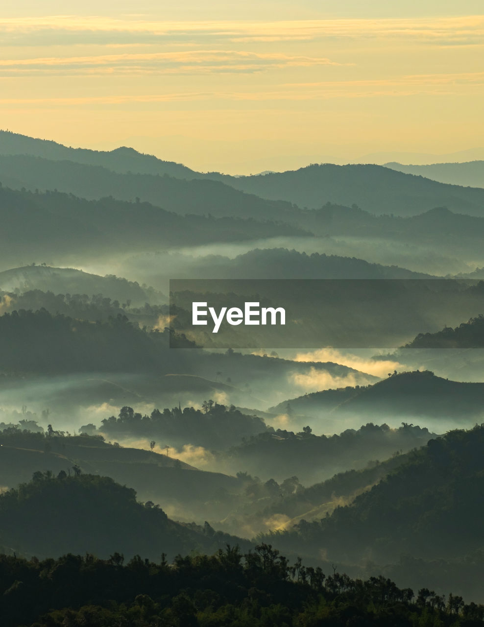 Scenic view of mountains against sky during sunset