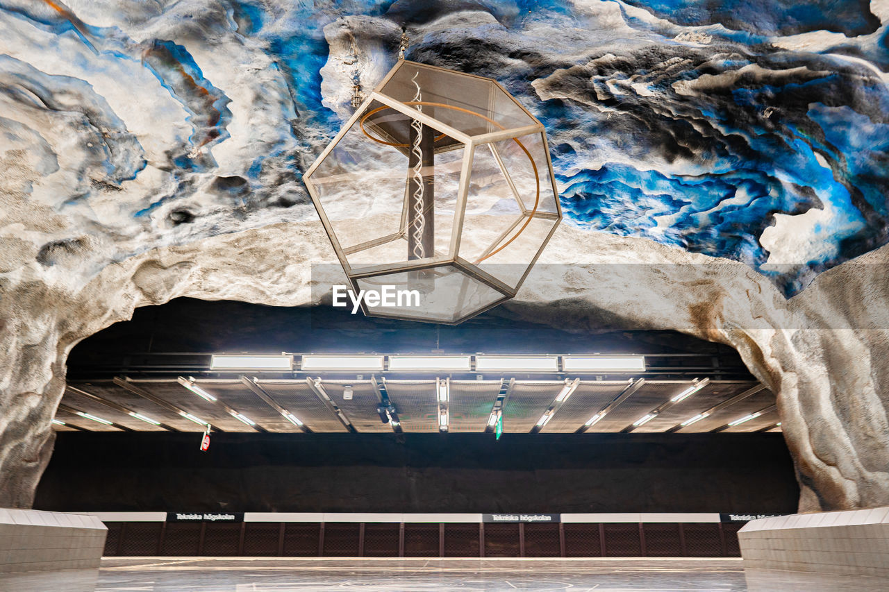 Decoration hanging on ceiling in subway station