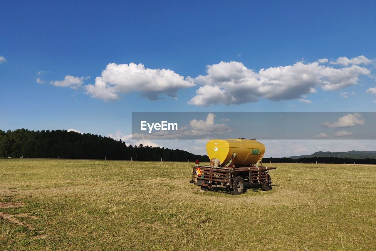 VIEW OF TRACTOR ON FIELD