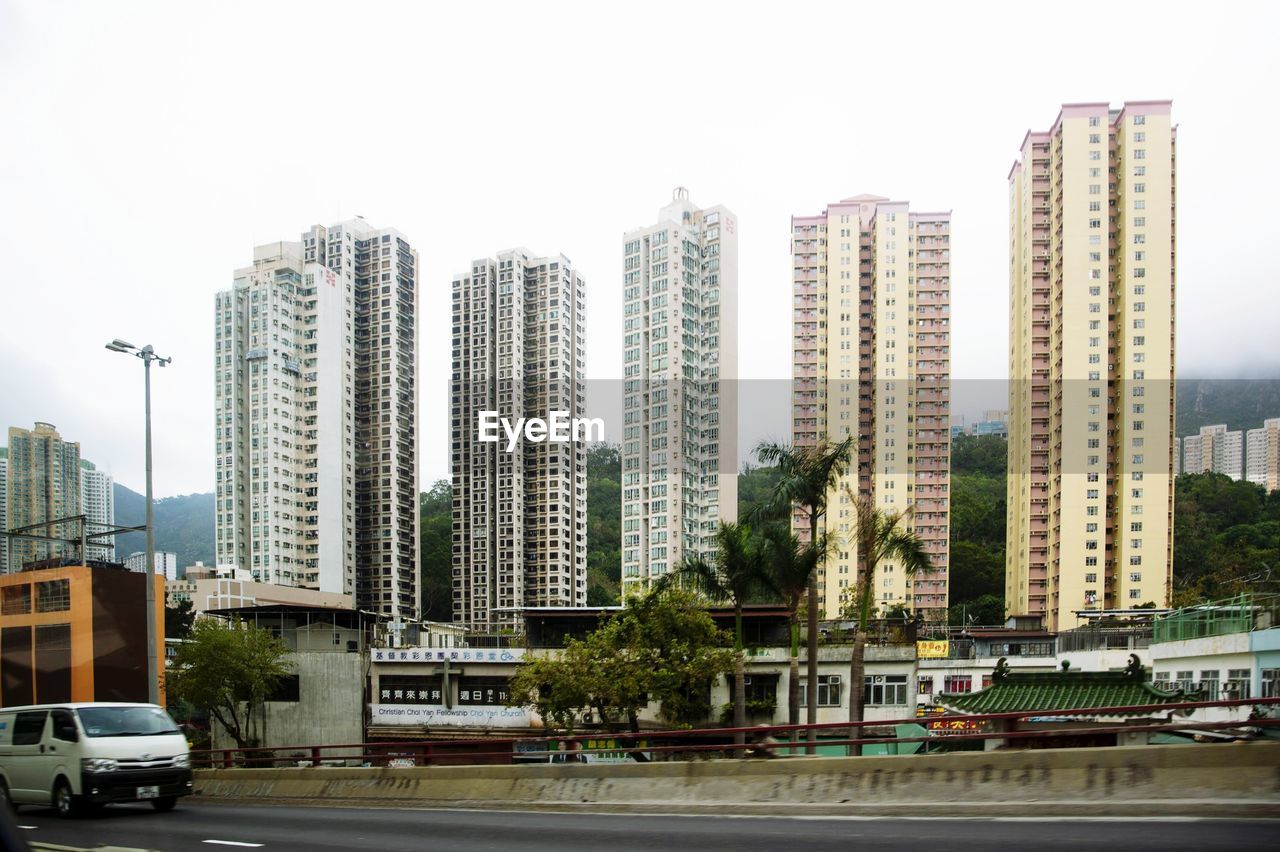 VIEW OF MODERN BUILDINGS AGAINST SKY