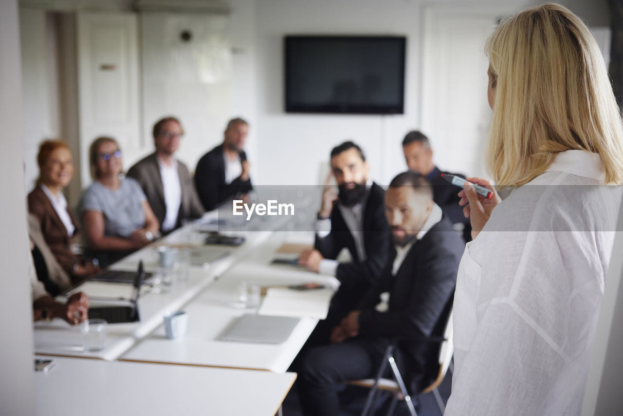 Woman having presentation at business meeting