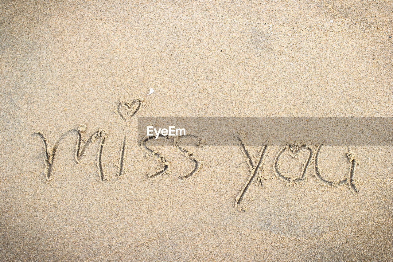 text, sand, beach, western script, communication, land, handwriting, positive emotion, no people, emotion, font, high angle view, message, love, nature, gratitude, writing