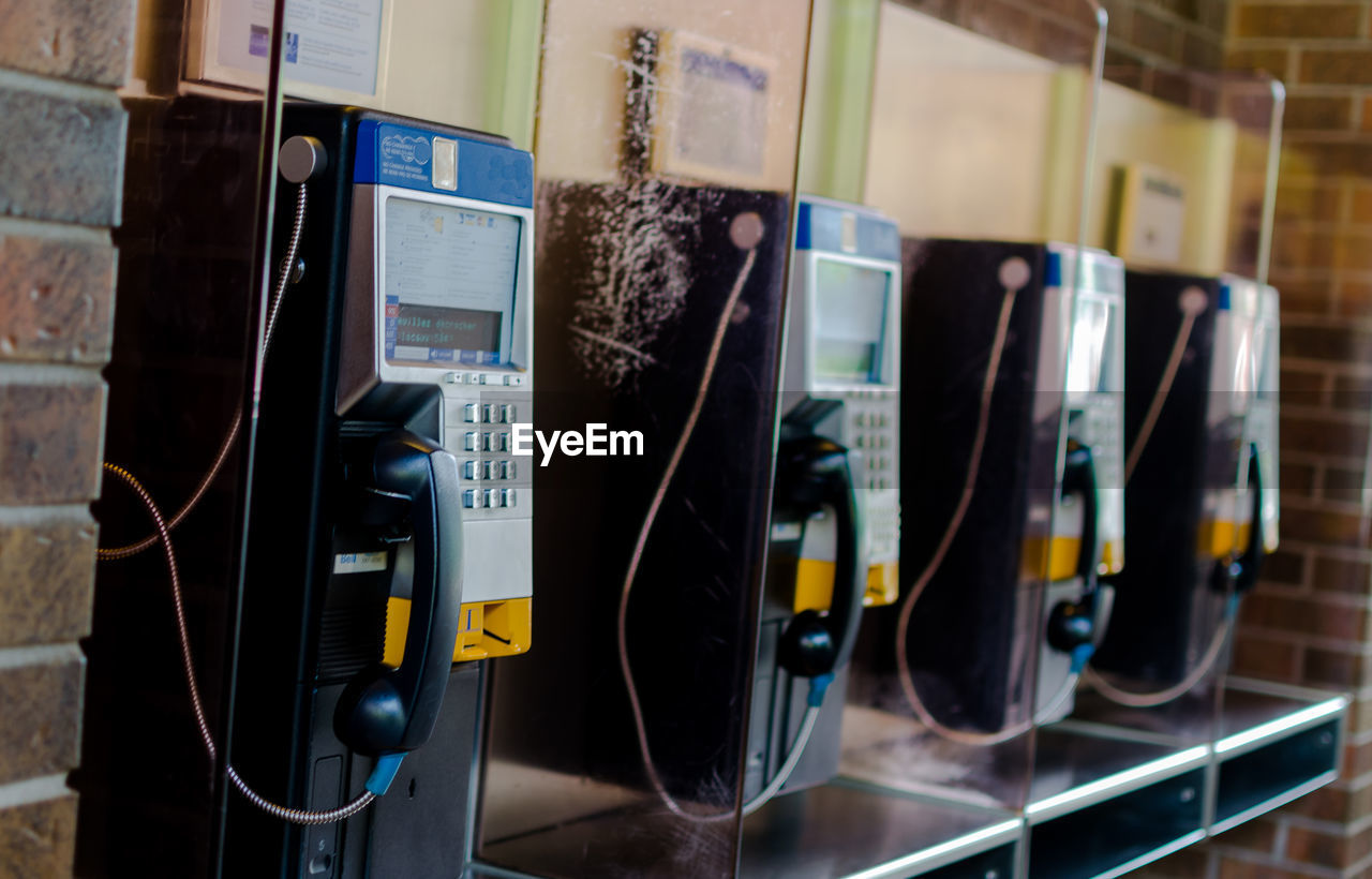 Close-up of pay phones