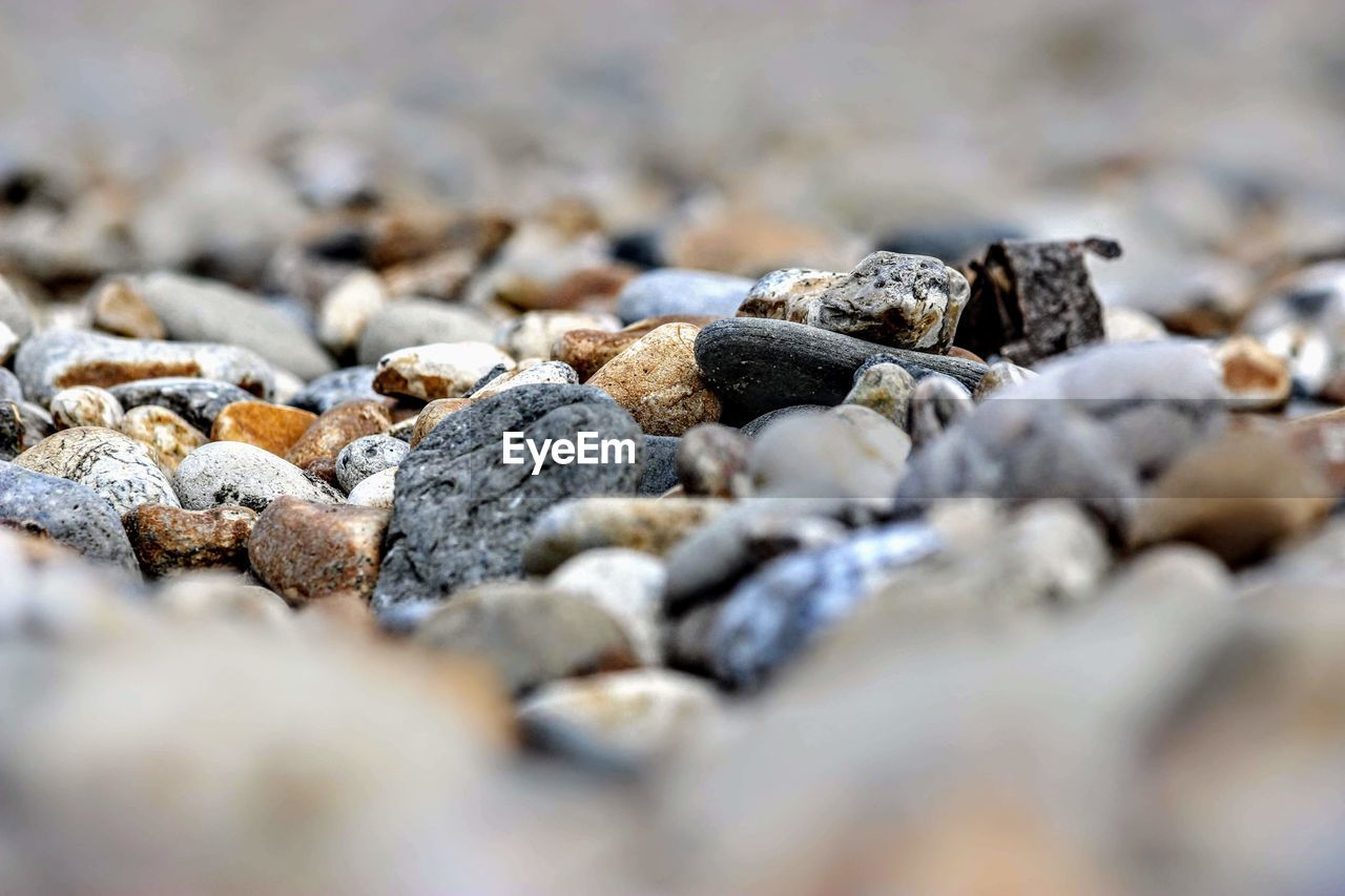 Close-up of stones on beach