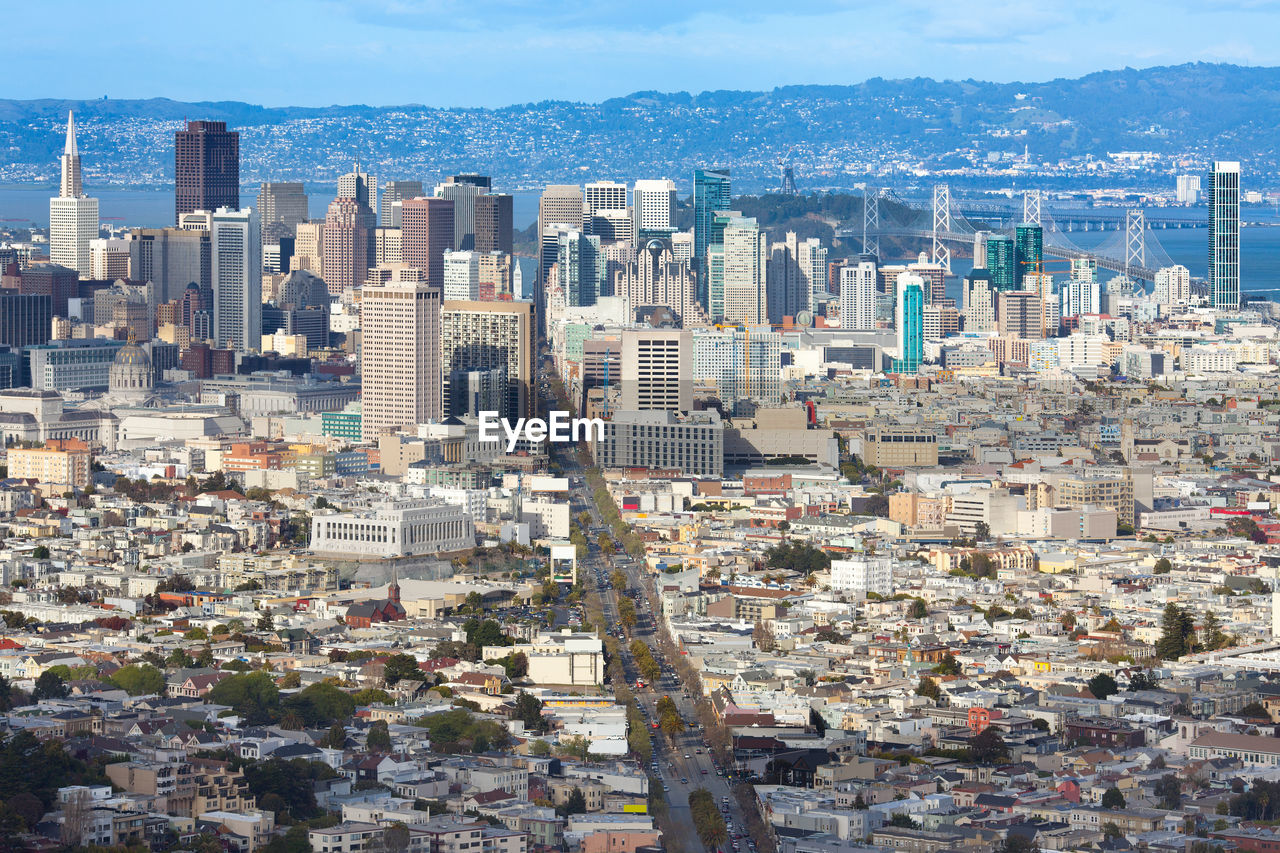 Aerial view of cityscape against sky