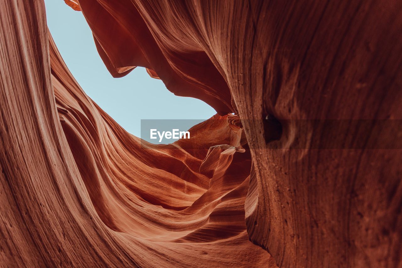 CLOSE-UP OF ROCK FORMATION IN THE BACKGROUND